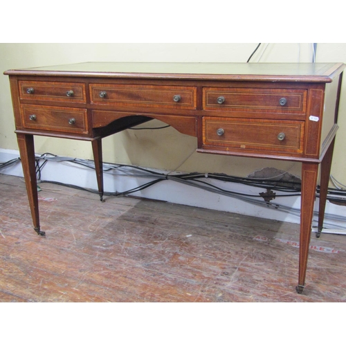 1655 - An inlaid Edwardian mahogany ladies writing desk with inset leather top, the central kneehole surrou... 