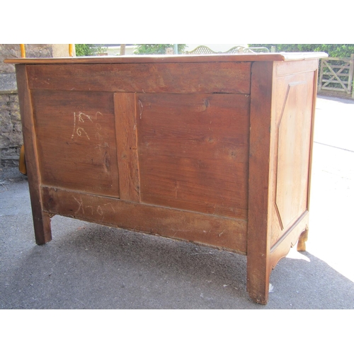 1657 - A late 18th century French provincial walnut commode of three drawers, with original brass fittings,... 