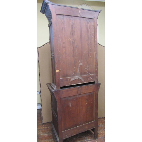 1666 - A mid-19th century gothic oak revival pier cabinet, the lower section enclosed by a panelled door wi... 