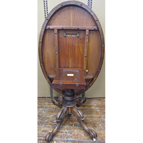 1668 - A Victorian walnut and burr walnut loo table, the oval top quarter panelled and raised on a carved p... 