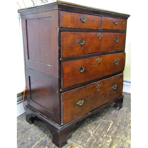 1676 - An 18th century walnut chest of three long and two short drawers on bracket supports, 96cm wide