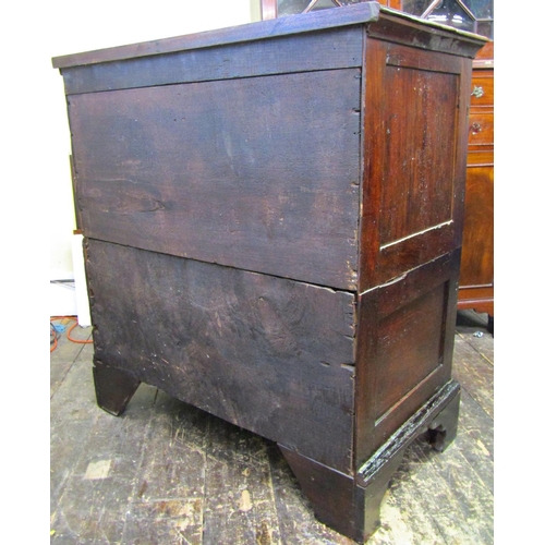 1676 - An 18th century walnut chest of three long and two short drawers on bracket supports, 96cm wide