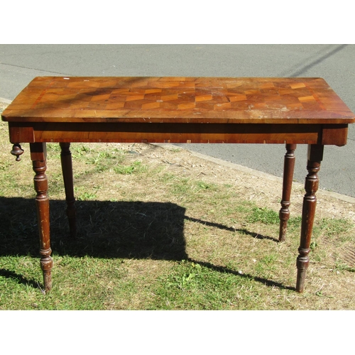 1679 - A parquetry table top, crossbanded and raised on later pine supports, 120 x 60cm