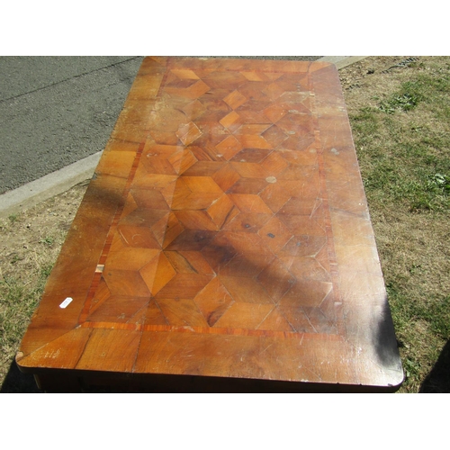 1679 - A parquetry table top, crossbanded and raised on later pine supports, 120 x 60cm