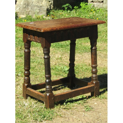 1680 - An Old English oak coffin or joint stool, with pegged frame on four turned supports