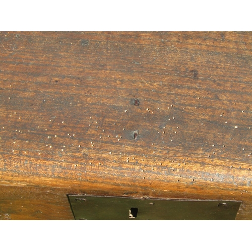 1681 - An 18th century elm six plank coffer, with steel lock plate dated 1763, monogrammed I.B.? 115cm wide