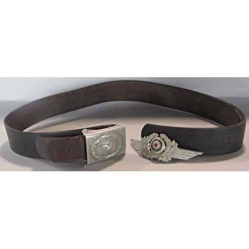 397 - Luftwaffe leather belt and clasp by Hugo Lang dated 1940, together with a Luftwaffe aluminium cap wr... 