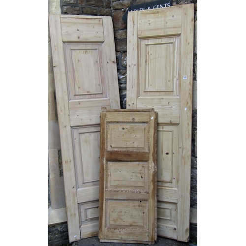 1098 - A pair of stripped pine sections of Georgian panelling, 232.5cm high x 67.5cm wide together with one... 