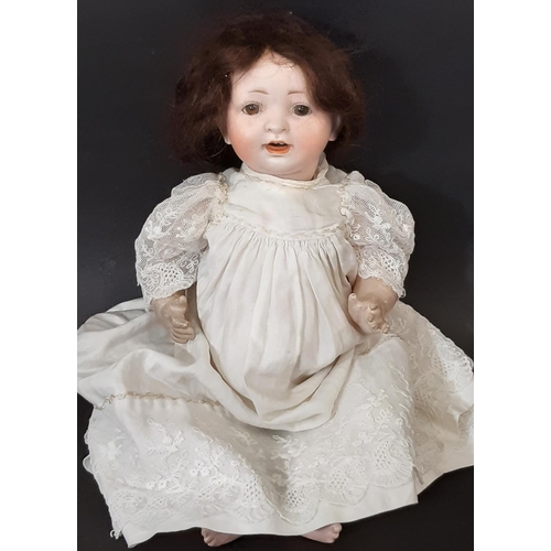 539 - Small early 20th century bisque head character doll with composition bent limb body, closing brown e... 