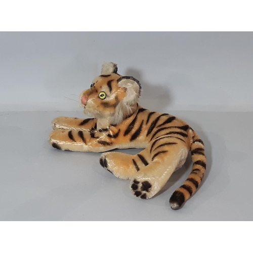 546 - Vintage soft toy collection including a standing dog by Merrythought, height 28cm, a tiger (no maker... 