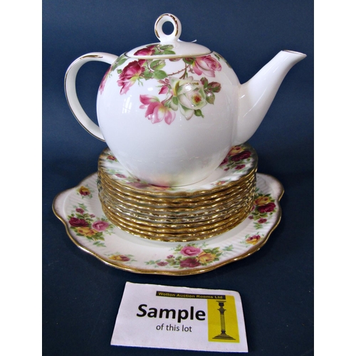 11 - A Royal Stafford Rose pattern tea service for eight, together with a further oriental tea service wi... 