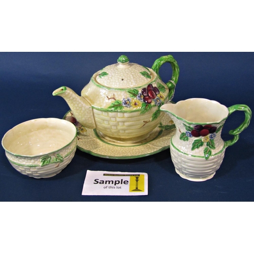 14 - A Crown Devon tea service for six with hand painted floral detail within green banded borders, compr... 