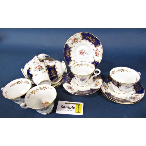 19 - A Royal Worcester part tea service with individual hand painted floral sprays, signed by H Everett, ... 