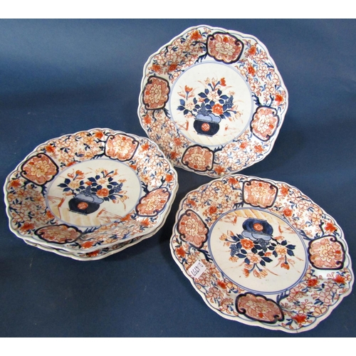 6 - Four 19th century Chinese porcelain plates of octagonal form in a red and blue colourway, together w... 