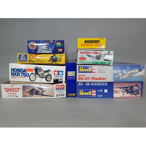 571 - Collection of vintage model kits and a game comprising boxed Subbuteo (missing 4 flags), kits by Tam... 