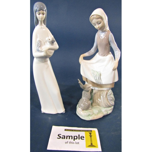 57 - Three Lladro figure groups comprising a young girl with rabbit, a group of swans and a single swan w... 