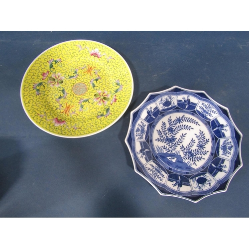 63 - A collection of oriental ceramics comprising a blue and white twelve sided (dodecagon) plate with ch... 