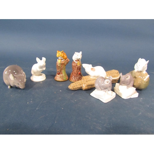 65 - A collection of Royal Copenhagen figurines of mice to include, mouse on sugar cubes no. 510 (2), mou... 