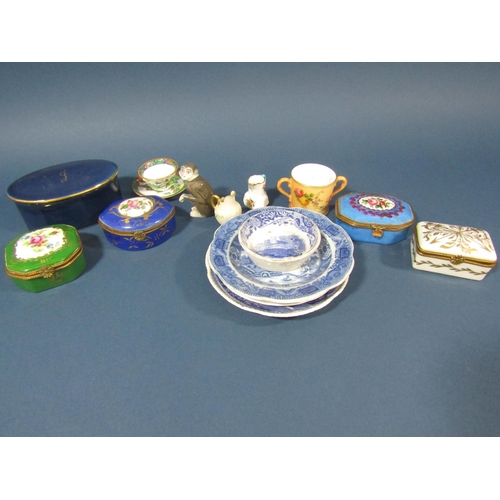 70 - A collection of miniature ceramics to include four lidded pill boxes, cup and saucer, two handled cu... 