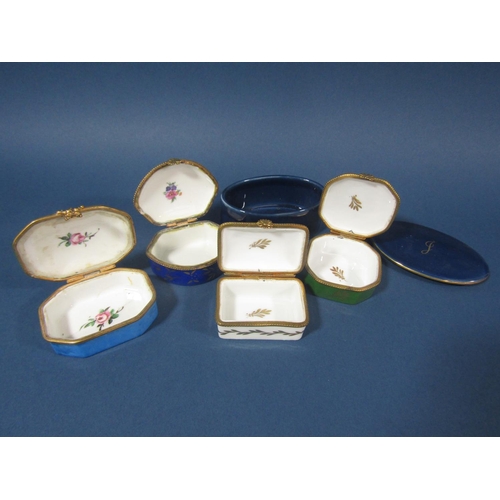 70 - A collection of miniature ceramics to include four lidded pill boxes, cup and saucer, two handled cu... 