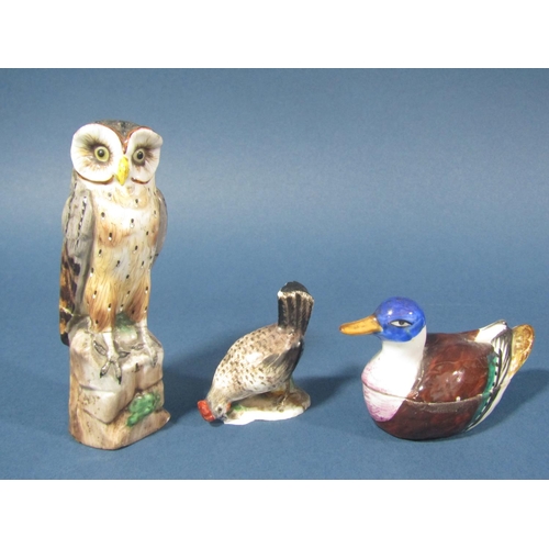 71 - A collection of miniature ceramics of birds comprising an owl, two birds of prey (possibly kestrels)... 