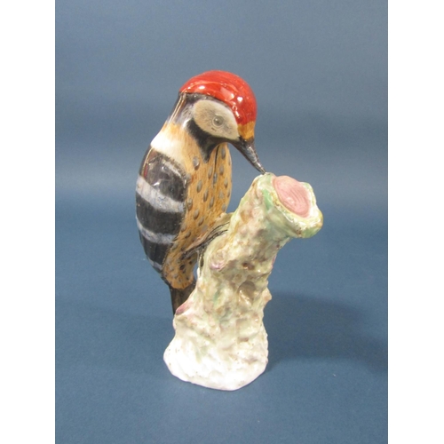 81 - A collection of three ceramic birds comprising woodpecker, bullfinch, thrush, 14cm tall approx