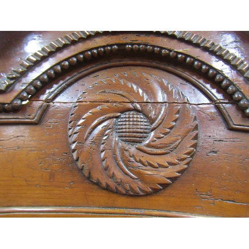 1543 - 18th century cherrywood armoire enclosed by a pair of shaped and panelled doors over a single frieze... 