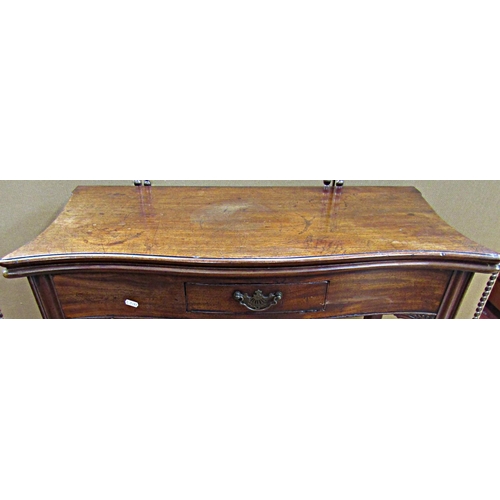 1547 - Georgian mahogany serpentine foldover tea table raised on four square moulded supports, enclosing a ... 