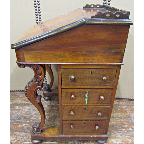 1550 - Victorian walnut and figured walnut davenport, cross banded in rosewood, carved supports with four r... 