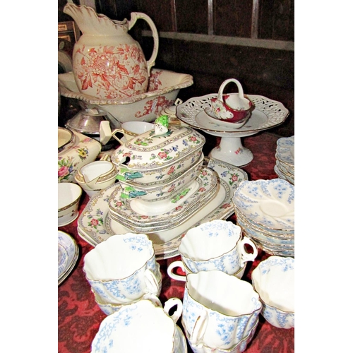 107 - A large collection of china wares comprising a Noritake tea for two set with gilt detail comprising ... 