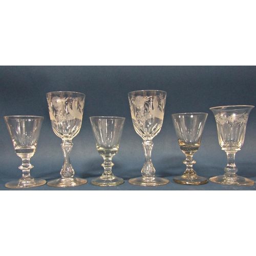 112 - Three Georgian baluster wine glasses, two further floral engraved wine glasses and a smaller engrave... 