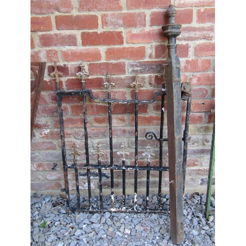 1042 - A 19th century wrought iron pedestrian side gate with simple square vertical bars with scroll detail... 
