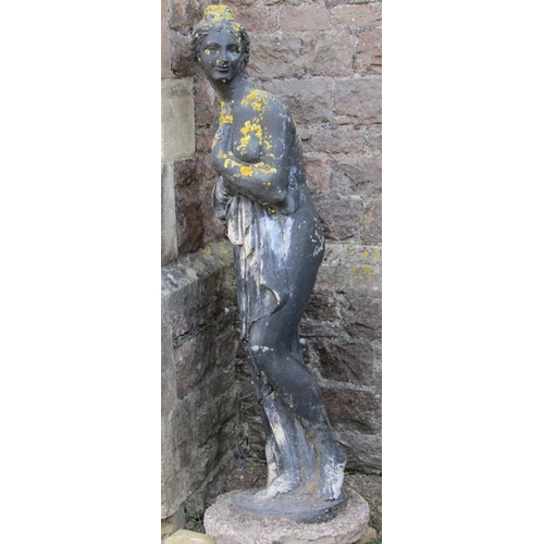 1054 - A large painted and weathered garden statue  