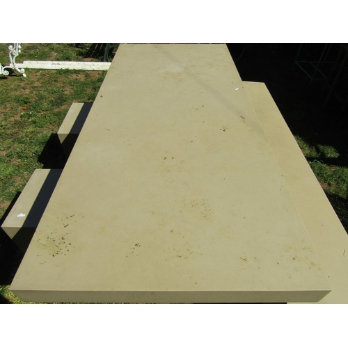 1057 - A contemporary Habitat composite mock buff coloured stone effect garden table of rectangular form, 2... 