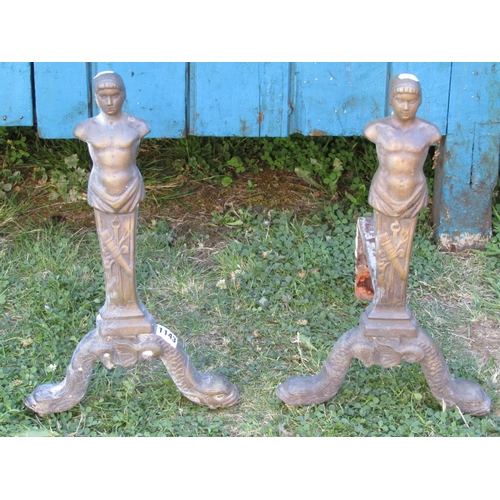 1077 - A pair of good quality heavy cast brass/possibly bronze andirons in the form of classical male half ... 