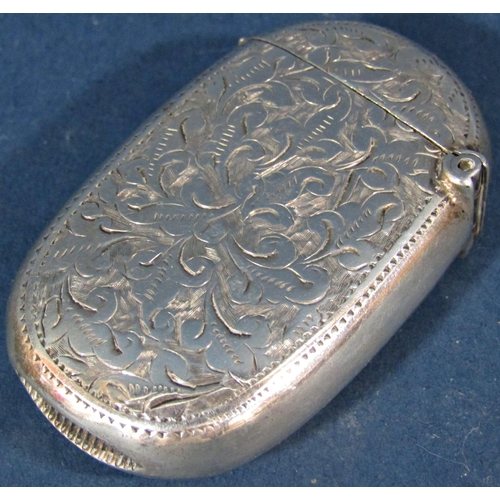 192 - A late Victorian silver vesta case with an all-over foliate engraving, Birmingham 1901, maker unknow... 