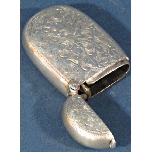 192 - A late Victorian silver vesta case with an all-over foliate engraving, Birmingham 1901, maker unknow... 