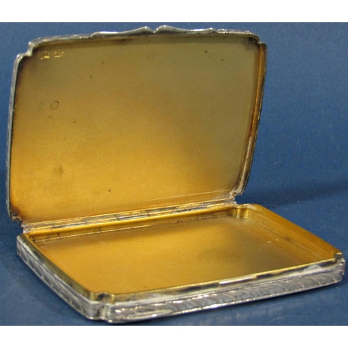 193 - A continental silver floral engraved card case with gilded interior, stamped 800, 1.9oz approx