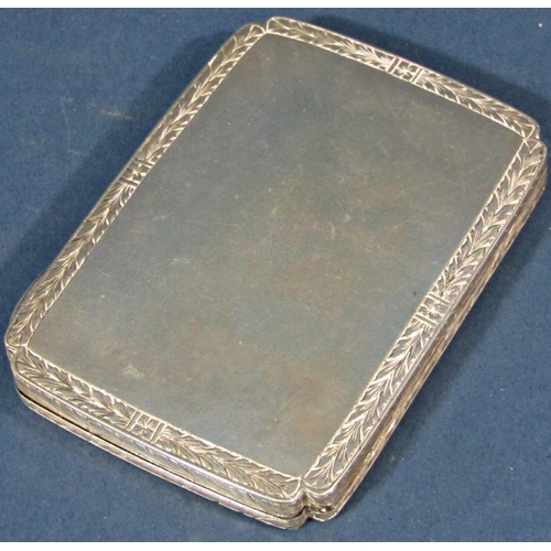 193 - A continental silver floral engraved card case with gilded interior, stamped 800, 1.9oz approx