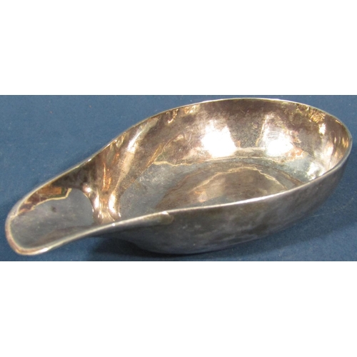 216 - An early 18th century silver bloodletting bowl, oval with a pouring lip, 11cm wide, hallmarks rubbed