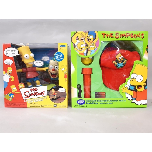 564 - A large collection of Simpsons themed games, toys and merchandise including Monopoly ©2003 and 3D Ch... 