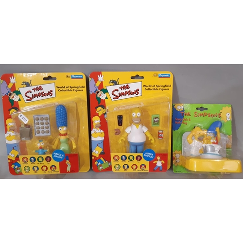 564 - A large collection of Simpsons themed games, toys and merchandise including Monopoly ©2003 and 3D Ch... 