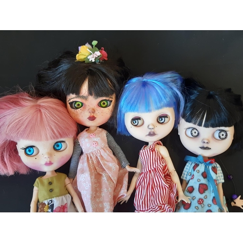 585 - Four dolls in the style of Blythe 'Neo' dolls, customised by 'Blythe Obsession', with colour changin... 