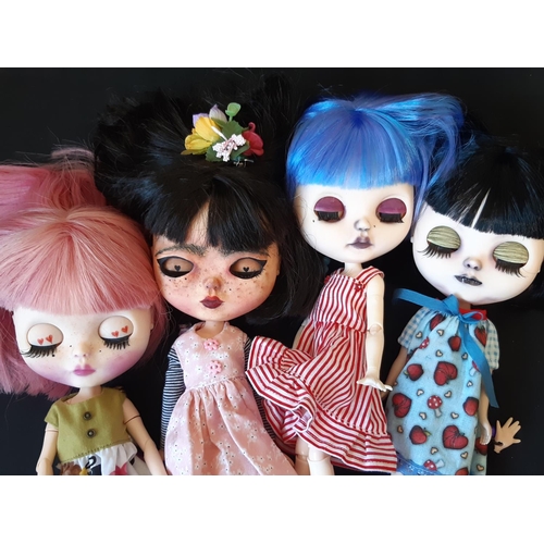 585 - Four dolls in the style of Blythe 'Neo' dolls, customised by 'Blythe Obsession', with colour changin... 