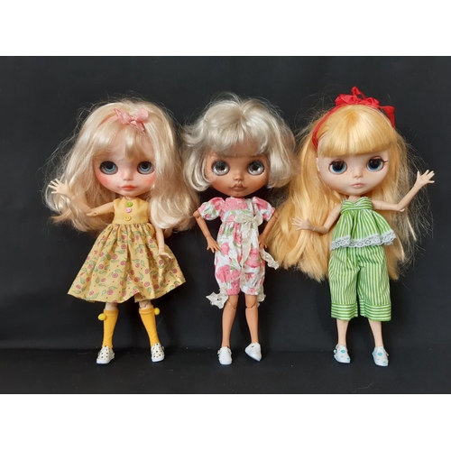 580 - Three customised Blythe dolls by Hasbro/Tomy; 'Neo' type with 2006 doll mould, jointed limbs, beaded... 