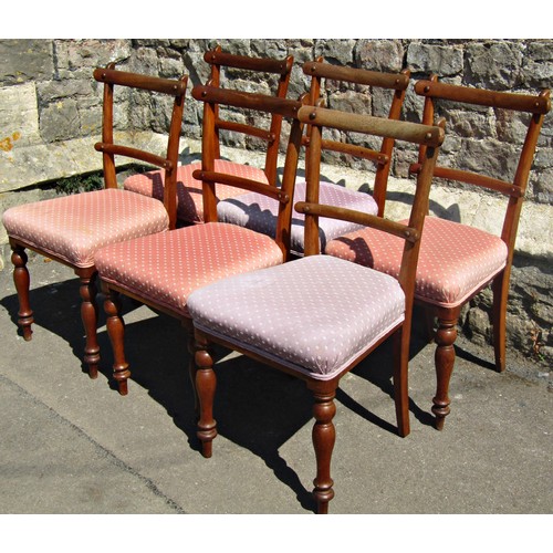 1184 - A set of six Victorian mahogany slender curved bar back dining chairs with upholstered seats raised ... 