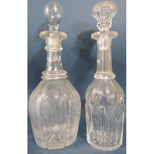 139 - Five 19th century glass decanters of varying design, all complete with the original stopper.