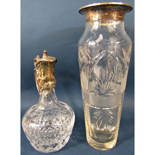 140 - An early 20th century engraved glass claret jug with a silver plated collar and handle, 27cm high, a... 