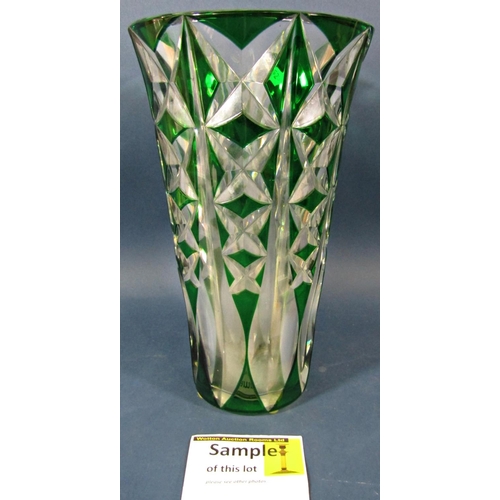 145 - A large green cut crystal vase 31cm high, a spherical glass paperweight, a decorative glass block wi... 