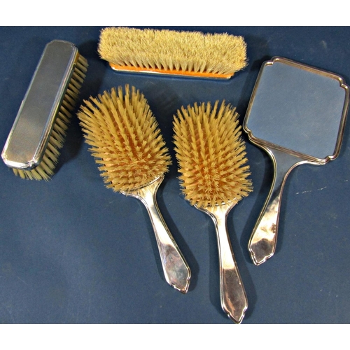 221 - A five piece engine turned silver brush and mirror set